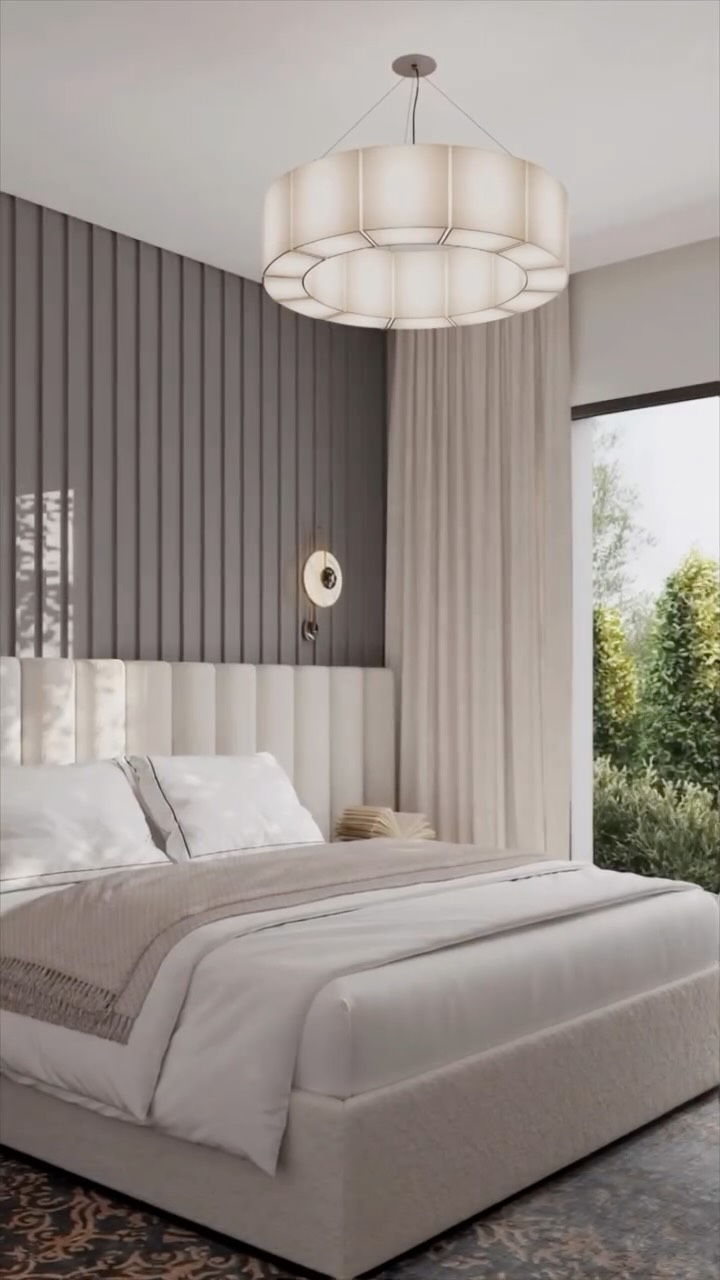 A serene bedroom designed for Belle Air — where architecture and tranquility meet.

In this space, we focused on creating a soft visual rhythm through layered textures: the vertical wall panels, the sculptural upholstered headboard, and the calm, matte textiles all work together to shape a sense of effortless harmony.
Natural light becomes part of the design — opening the room to the garden and bringing the outside in. The palette is intentionally muted, allowing form, proportion and materiality to speak for themselves.

A quiet place for thoughtful living.
A signature of Bolshakova Studio’s refined approach to modern comfort.