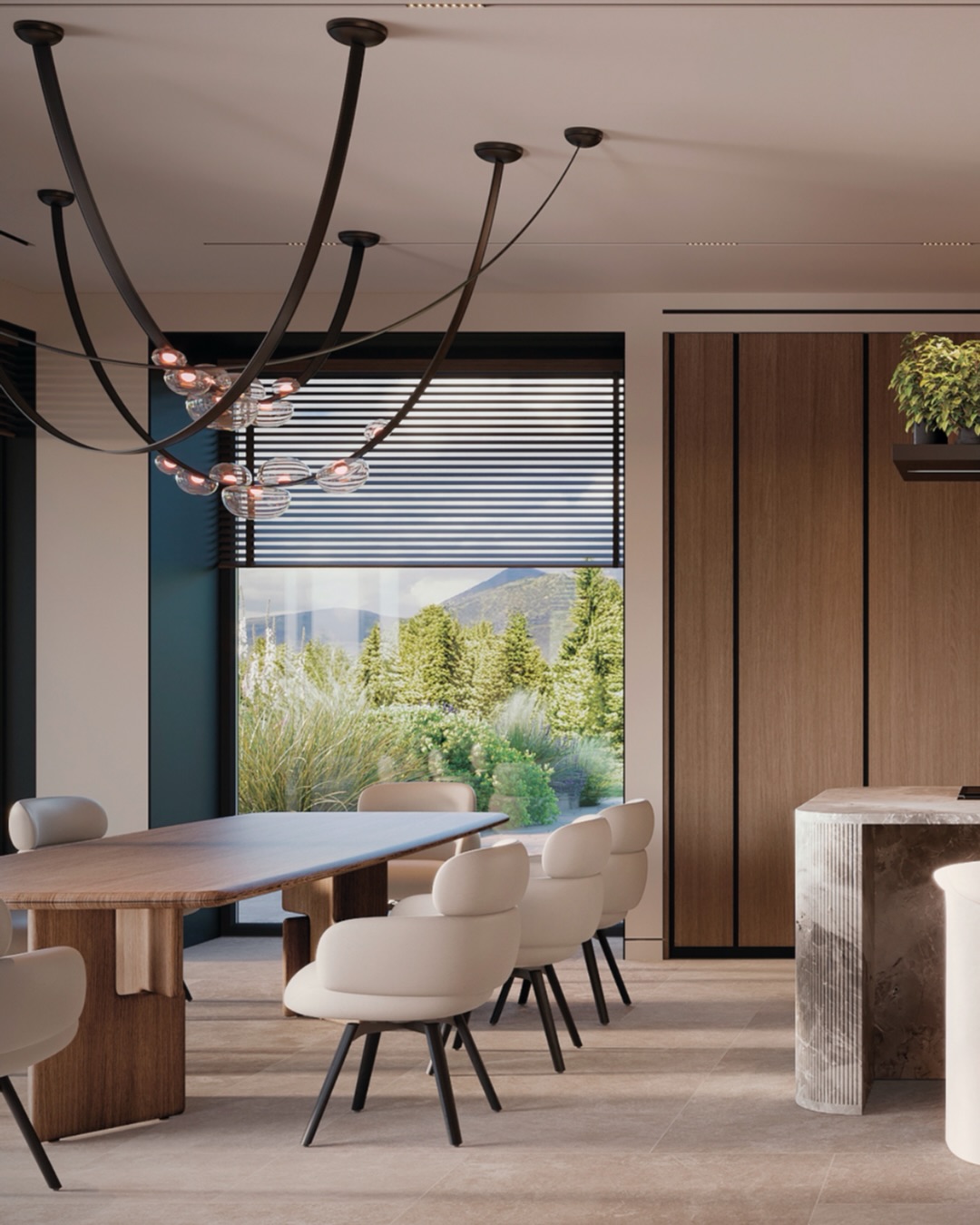 A sculptural marble island becomes both the main working surface and a social focal point. Natural stone contrasts with warm wood cabinetry and dark architectural accents, creating a balanced and timeless palette. Glass cabinets with integrated lighting add depth and elegance, while large panoramic windows fill the space with natural light and connect the interior with the surrounding landscape.

A kitchen designed not only for cooking, but for living.

Contact us:
welcome@bolshakovastudio.com
www.bolshakovastudio.com