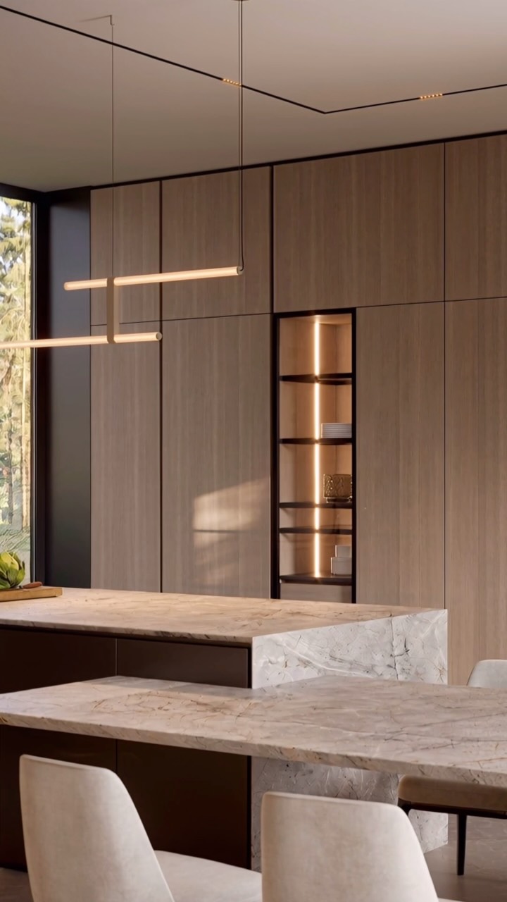 A kitchen designed as part of the architecture.

Clean lines, warm wood, natural stone, and carefully integrated lighting create a space where function feels effortless and every element has its place.

From the concealed storage to the sculptural stone surfaces, the design is built around simplicity, comfort, and the way the space is experienced every day.

Quiet luxury. Precise details. Timeless design.

—

Team:
@natalybolshakova @andrii.shuliak
@kalinina_iryna_ukraina @olha_drachuk @diloyan.e @matskevychlera

Architecture:
@vivas_architectural_bureau @vitaliy_vasyagin

Contact us:
welcome@bolshakovastudio.com
www.bolshakovastudio.com