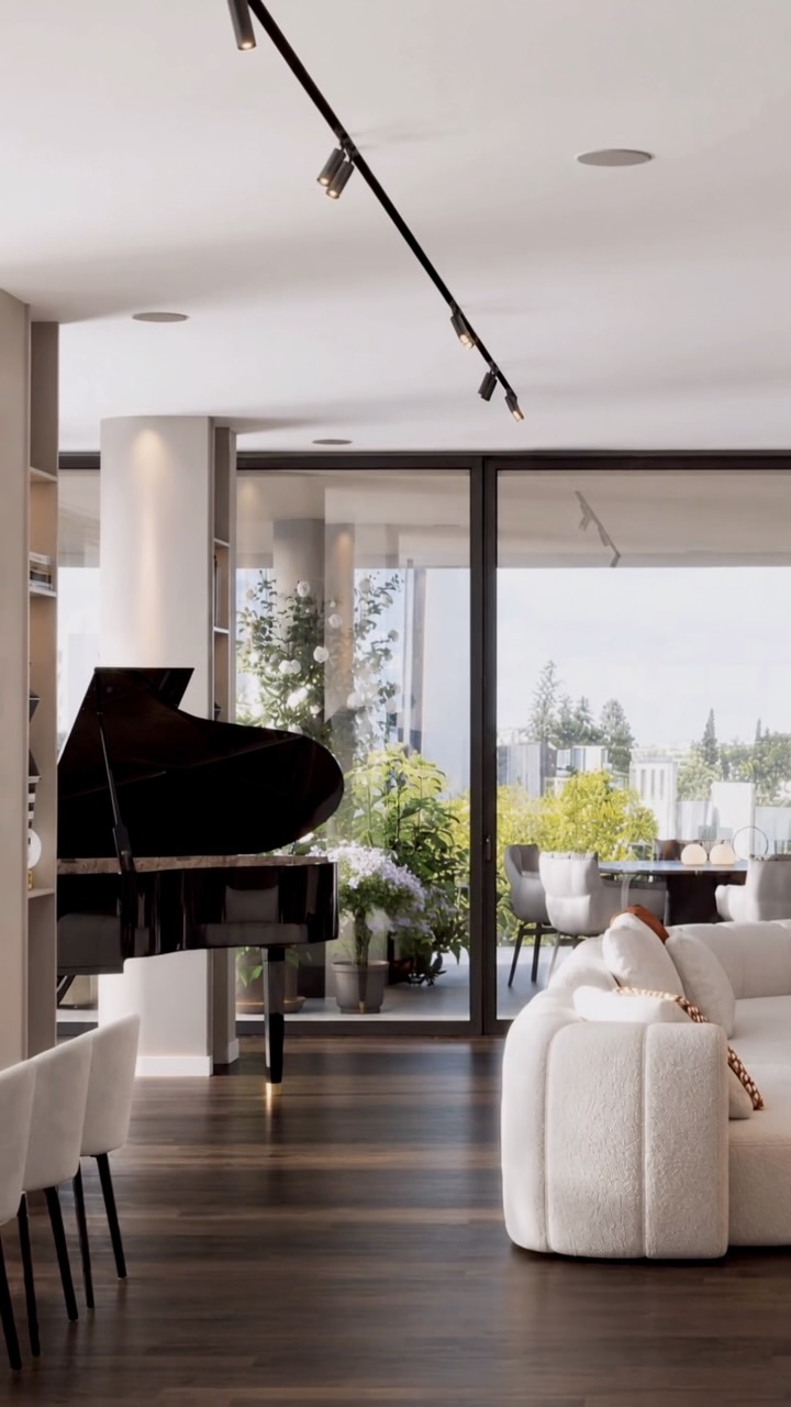 A living space in Nicosia where architecture, art, and everyday life come together.

The open-plan interior is defined by warm wood, sculptural furniture, natural stone, and expressive lighting. Soft neutral tones create a calm foundation, while rich terracotta accents bring warmth and character to the space.

Floor-to-ceiling windows fill the interior with natural light and blur the boundaries between indoors and outdoors. From the grand piano to the carefully selected art pieces, every element contributes to an atmosphere that feels sophisticated, personal, and designed to be lived in.

A contemporary home shaped by balance, comfort, and attention to detail.

—

Team:
@natalybolshakova @andrii.shuliak @kuts_nata 
@kalinina_iryna_ukraina @olha_drachuk @diloyan.e @matskevychlera @iyourrene 

Contact us:
welcome@bolshakovastudio.com
www.bolshakovastudio.com